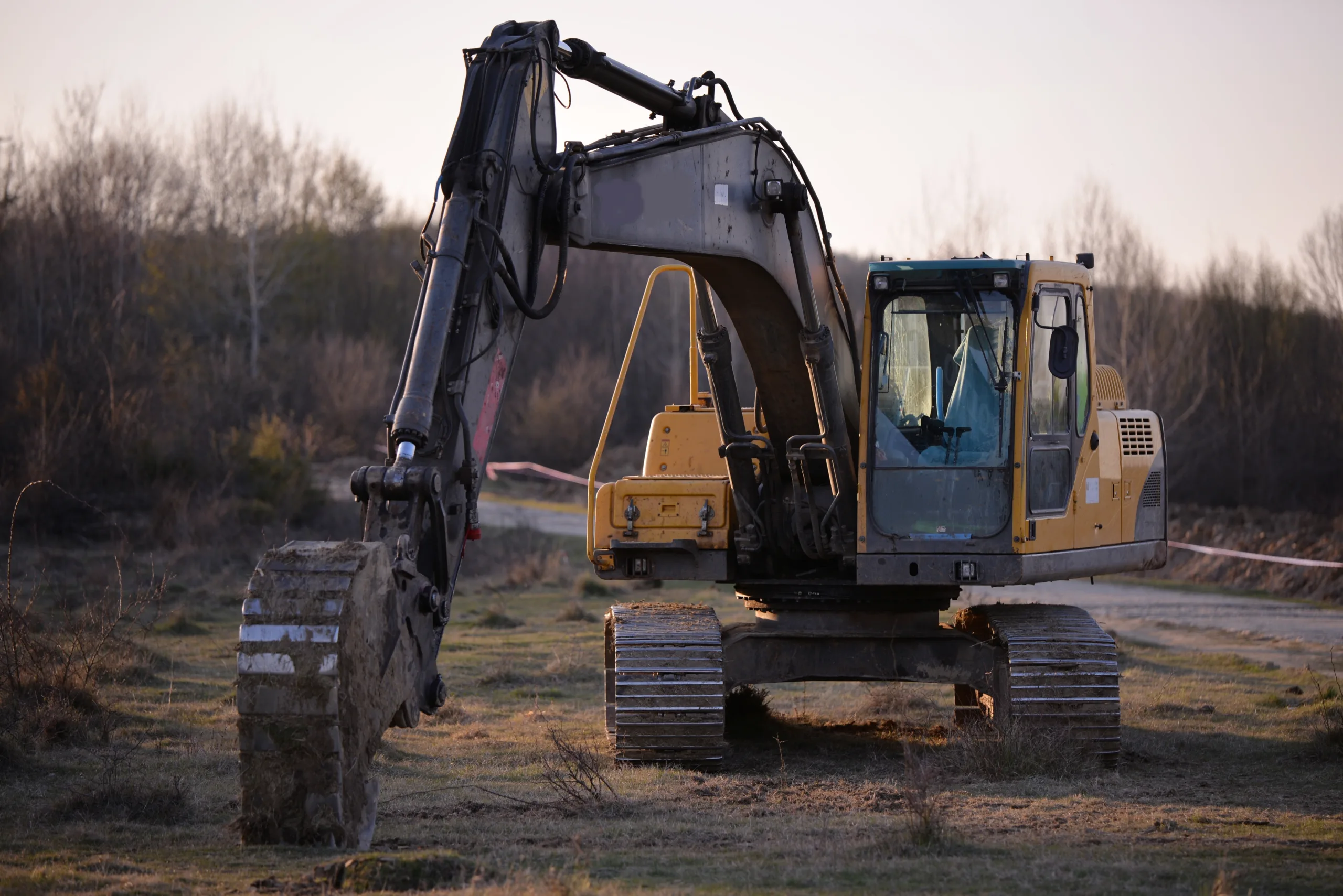 CAT 305.5 mini excavator stationed at a construction site in Seattle, highlighting rugged design and compact power — ideal for projects needing CAT 305.5 mini excavator details.