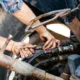 Technician performing emergency diesel repair services on heavy-duty machinery in Seattle, ensuring rapid engine troubleshooting and restoration.