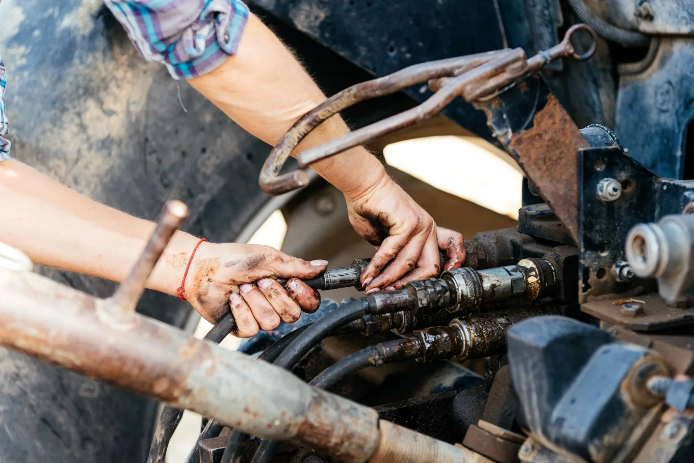 Technician performing emergency diesel repair services on heavy-duty machinery in Seattle, ensuring rapid engine troubleshooting and restoration.
