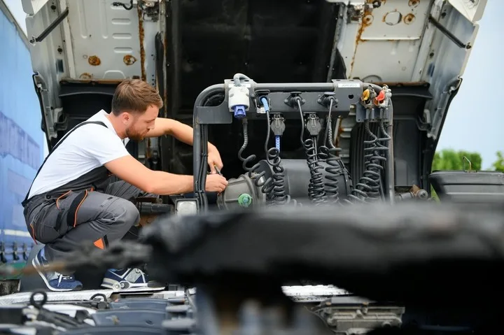 representing a professional mobile truck repair service that provides roadside assistance and repairs for heavy vehicles.