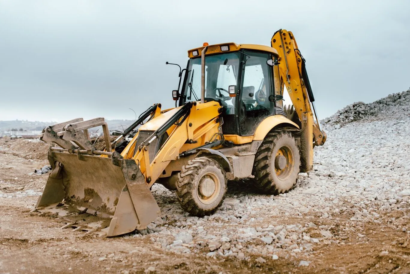 Representing the versatility and power available through construction equipment rental services for building and excavation projects.