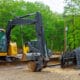 A line of immaculately maintained heavy earthmoving equipment and aerial lifts ready for dispatch through the premium williams equipment rentals fleet program in Washington.
