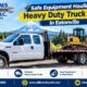 Commercial contractor securing an earthmoving trailer to a heavy duty truck rental in Eatonville for safe jobsite machinery transport.